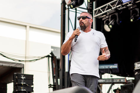 Andy speaking on stage