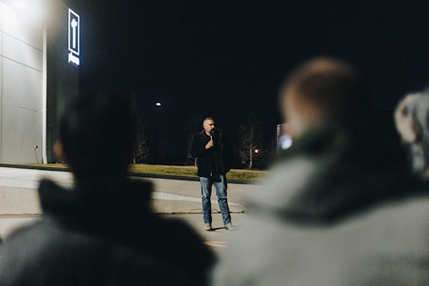 Andy talking outside to a group