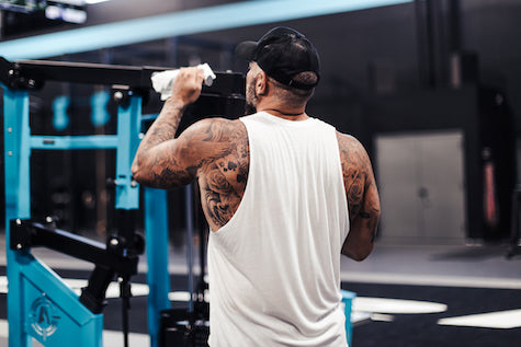 Andy wiping down gym equipment