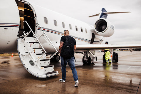 Andy walking on a plane. 