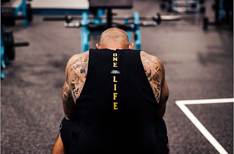 Andy sitting down in the gym