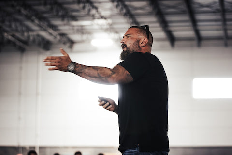 Andy speaking in a warehouse