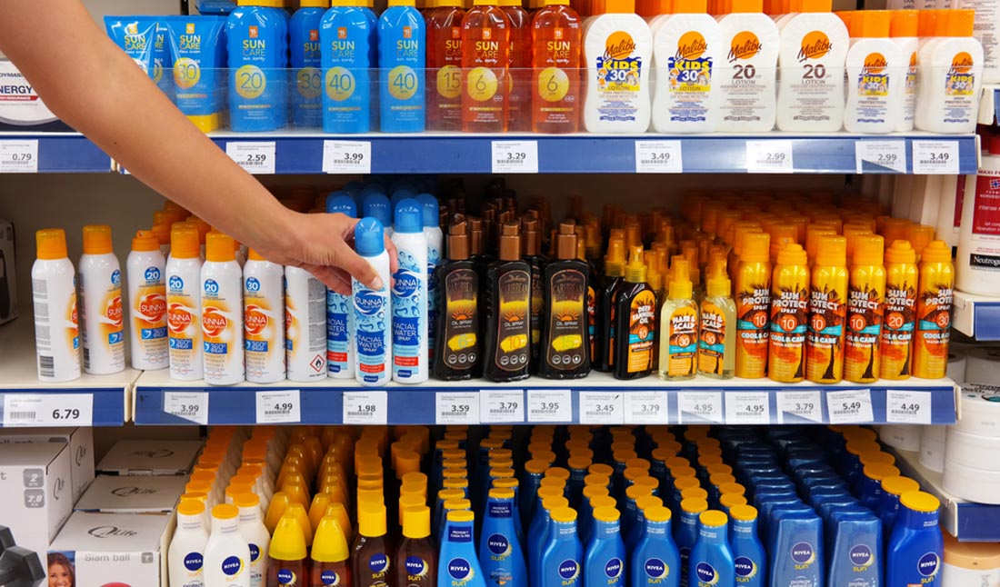 customer grabbing sunscreen