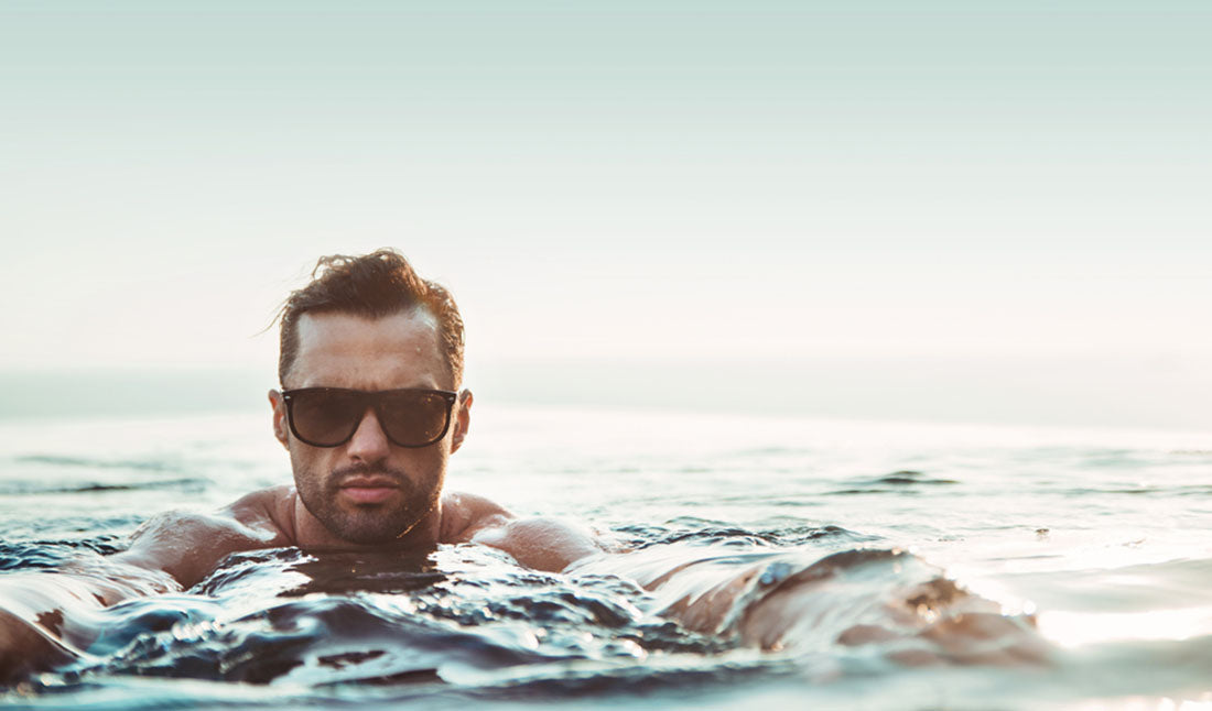 man wearing glasses in swimming pool