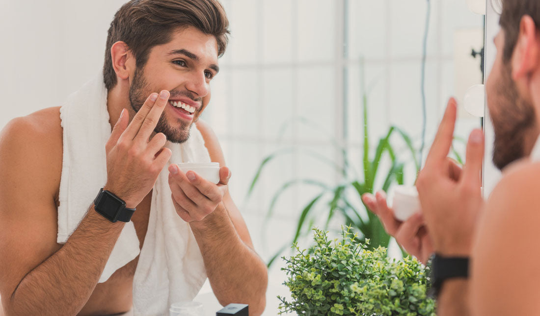 Man applying face cream