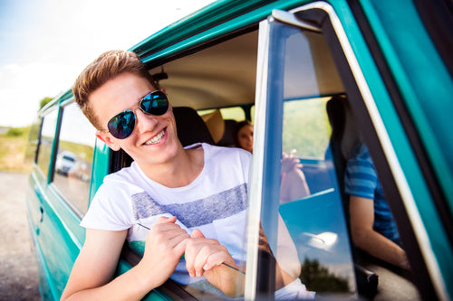 teenage boy in car