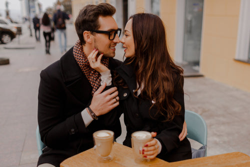 woman gently touching boyfriends face