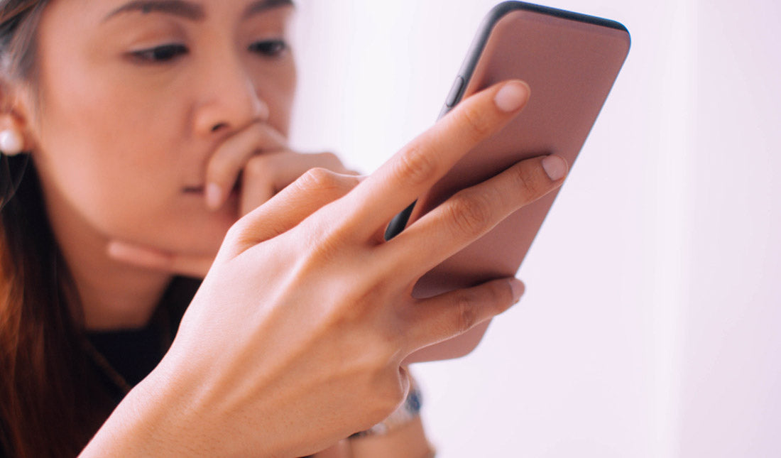 young woman using mobile phone