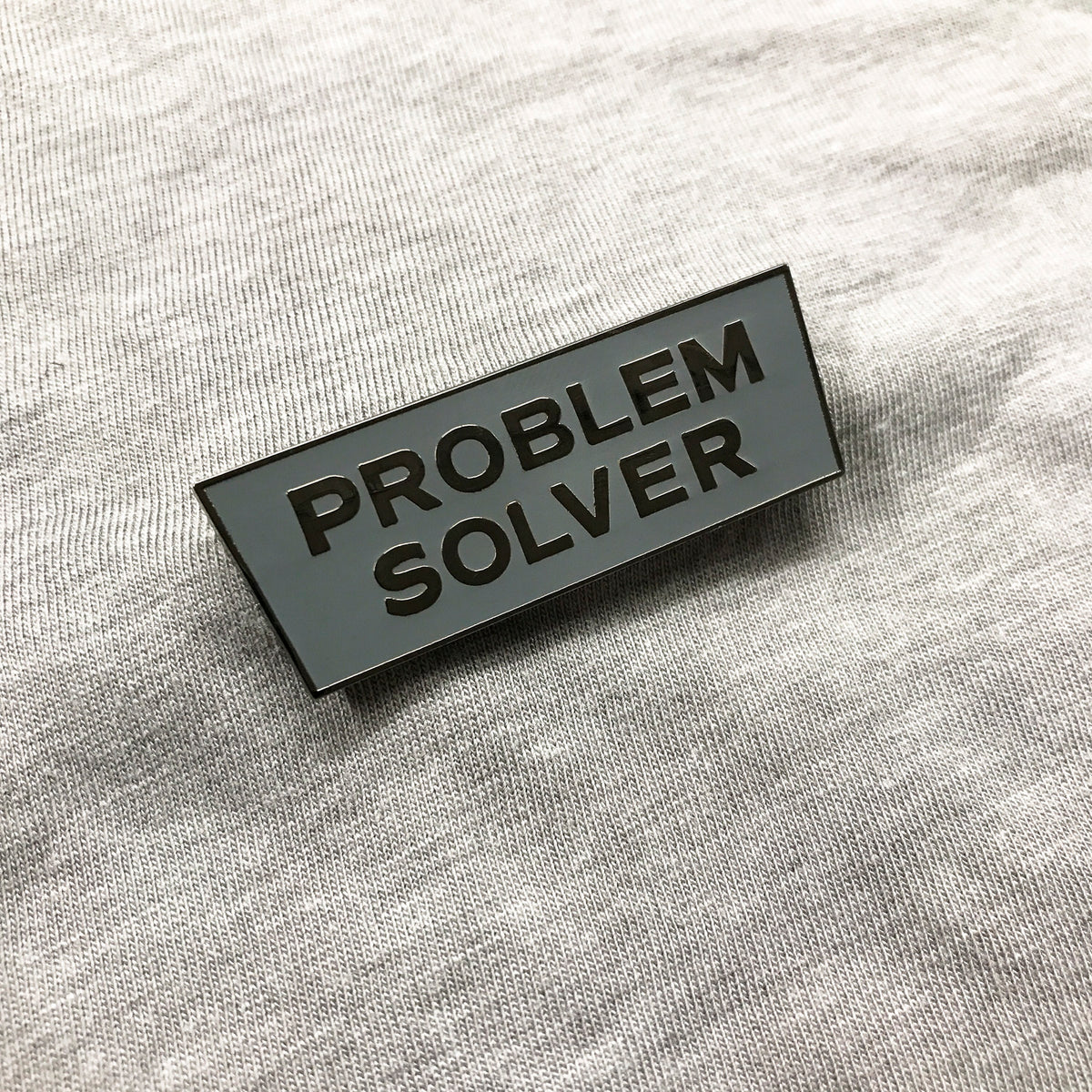 Problem Solver Pin (Gray with nickel letters) – Danger Prints