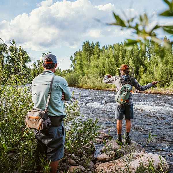 816332015694 EHLP-P Fishpond Elkhorn Lumbar Pack Pebble New Fishpond Waist Pack Front In The Wild Fishing River