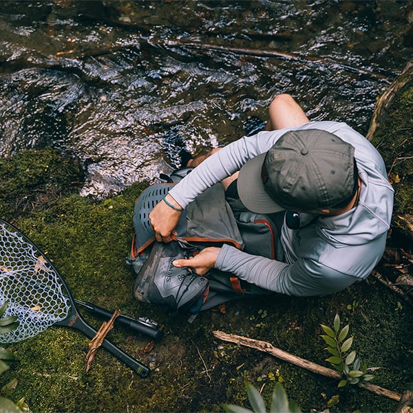 FHBP 816332014765 Fishpond Firehole Fishing and Travel Backpack In The Wild Gearing Up At River