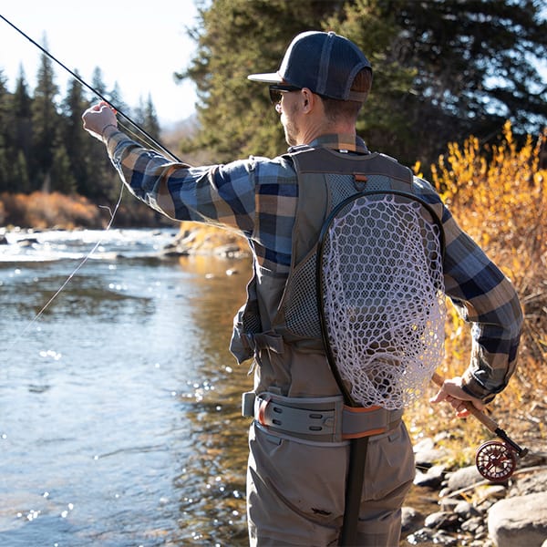 FHV-G 816332014970 Fishpond Flint Hills Fly Fishing Vest Back View Fishing On River