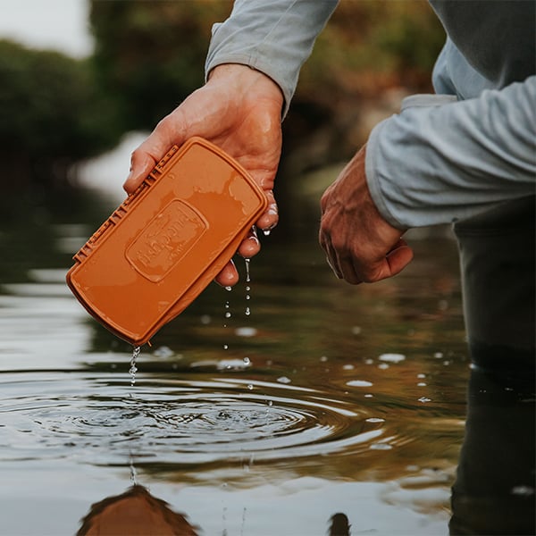 TPFB-BO 816332014314 Fishpond Tacky Pescador Waterproof Fly Fishing Fly Box With Silicone Insert Burnt Orange Submerged In The Wild