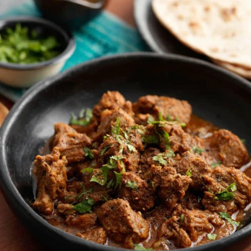 Grass Fed Lamb Rogan Josh Curry with Cauliflower Rice, Spinach, Onion and Capsicum.jpg__PID:e642e01b-af95-44c8-ab99-ce2222e84584