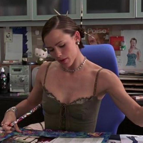 Jennifer Garner wears Hair Stick Chopsticks in the movie 13 Going on 30