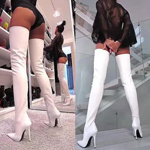 women in thigh high leather boots