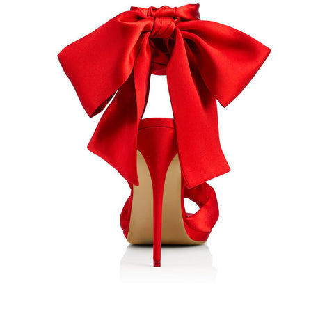 red heels with a bow