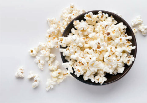 Foods that contain trans fats such as pop corn are high in cholesterol