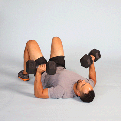 A man doing a Dumbbell Floor Press Exercise 
