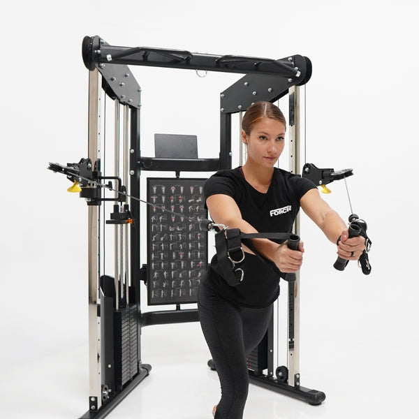 Woman using the Force USA Functional Trainer Dual Pulleys