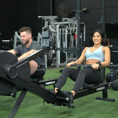 Couple Using Two Force USA R3 Rowers