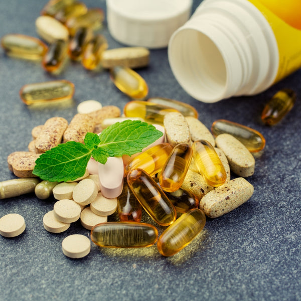 Various Multivitamins laid on a table