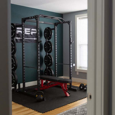 REP Fitness PR1100 Power Rack and AB4000 Adjustable Bench in a room inside a house | Gym and Fitness