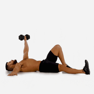 A man doing a Turkish GetUp Dumbbell Exercise 
