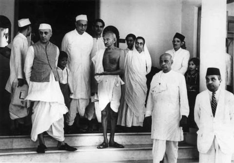 Pandit Nehru with the Father of the Nation Mahatma Gandhi and Sardar Vallabhai Patel, waiting for a car outside Birla House, Bombay. 
