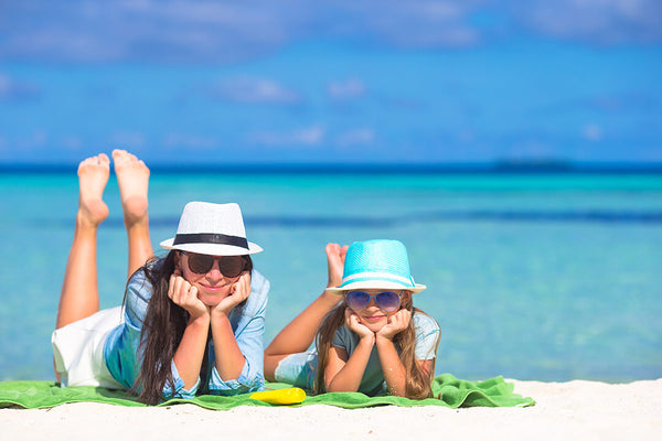 Mom and kid on the beach