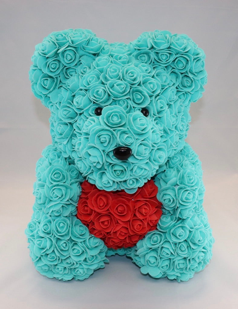 teddy bear with blue roses