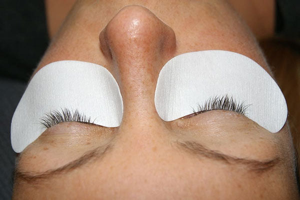 lash removal cotton pads under eyes