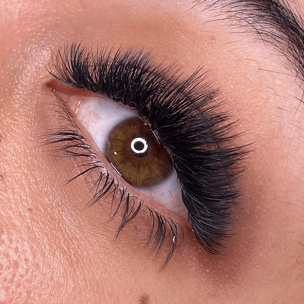 Closeup of a woman’s eye with lash extensions