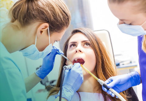 Girl having work done at the dentist | NewSmile®