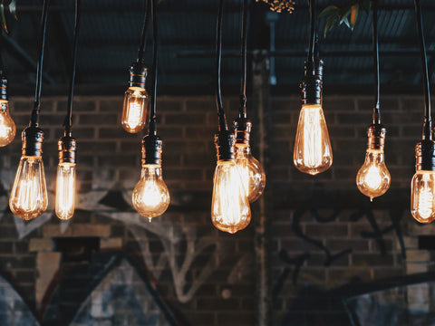 lighted LED bulbs suspended from ceiling