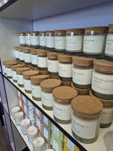 handmade candles on shelf at Local Boom Vancouver Gift Store