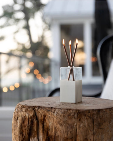 The Everlasting Candle in White Vase with Gold sticks