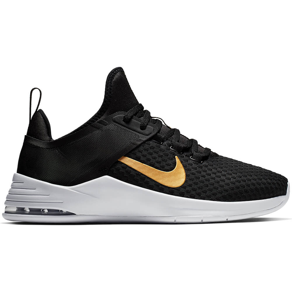 nike women's black and gold shoes