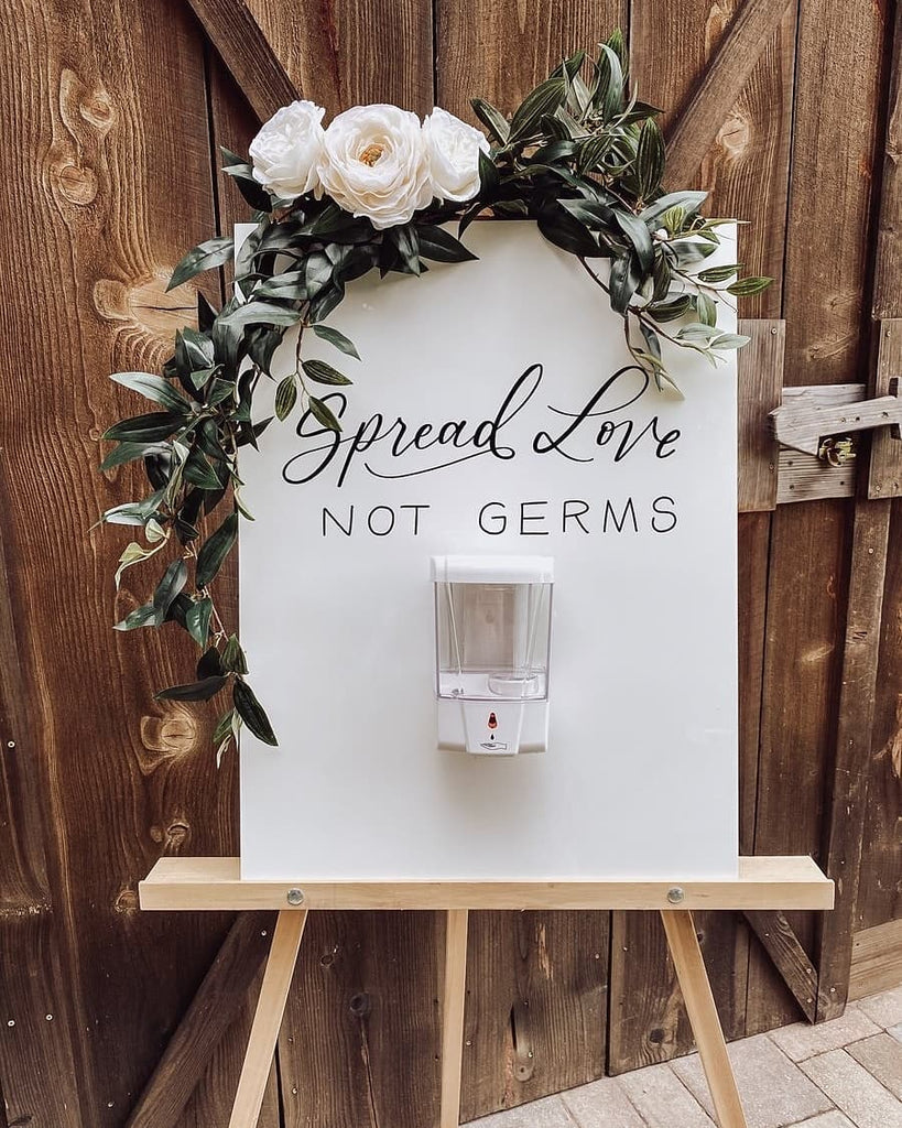 spread love not germs sign