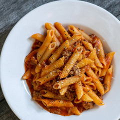 pasta with red sauce in a bowl