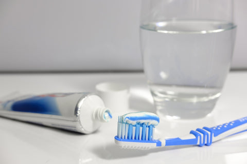 Cleaning and brushing your teeth removes harmful food debris that may lodge in cracks.