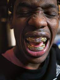Travis Scott Grillz: Everything you need to know about his new Teeth ...