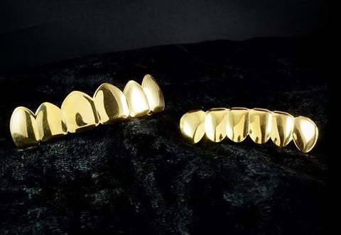 teeth top and bottom gold grillz