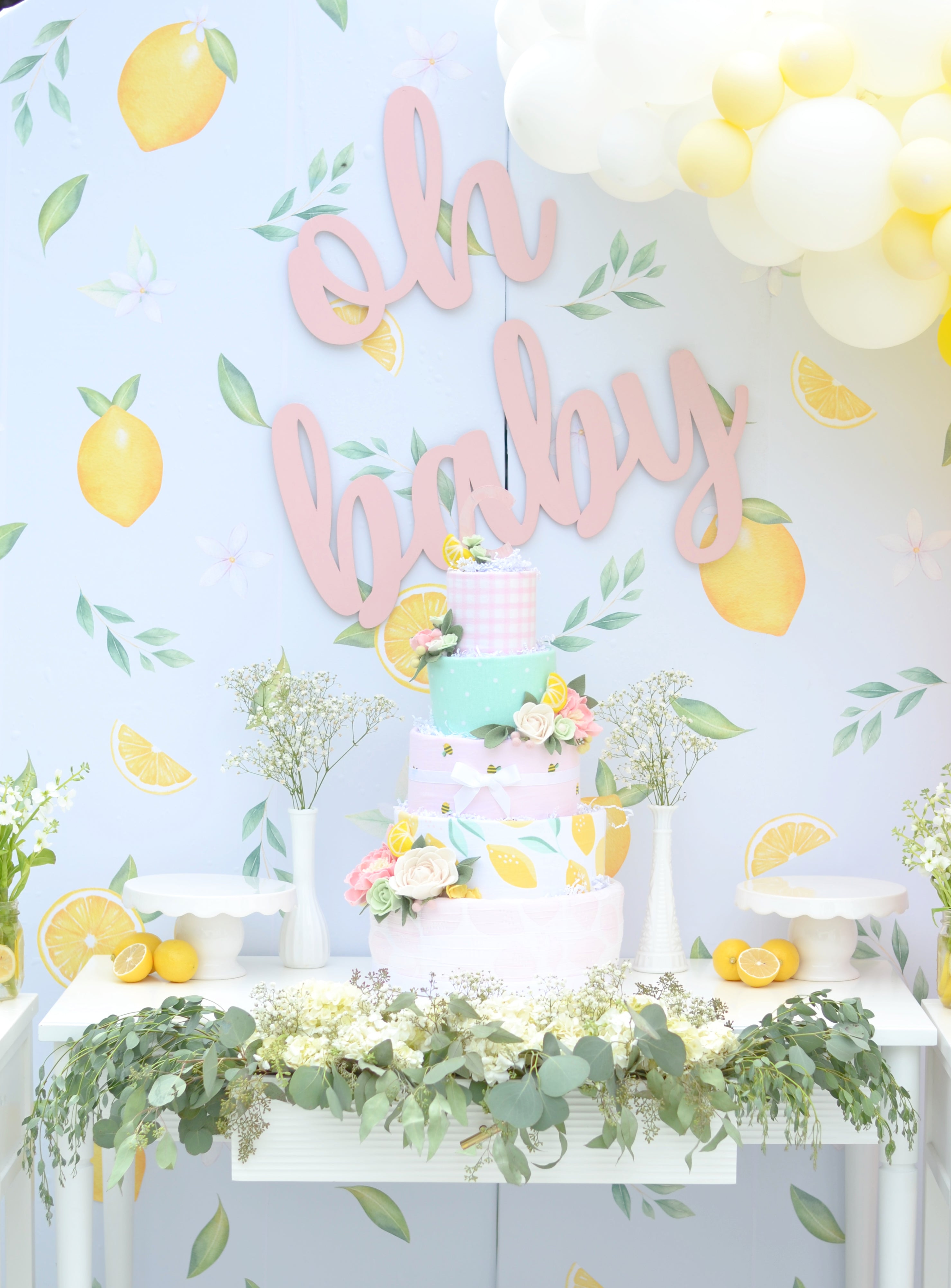 baby girl pink lemon shower diaper cake table