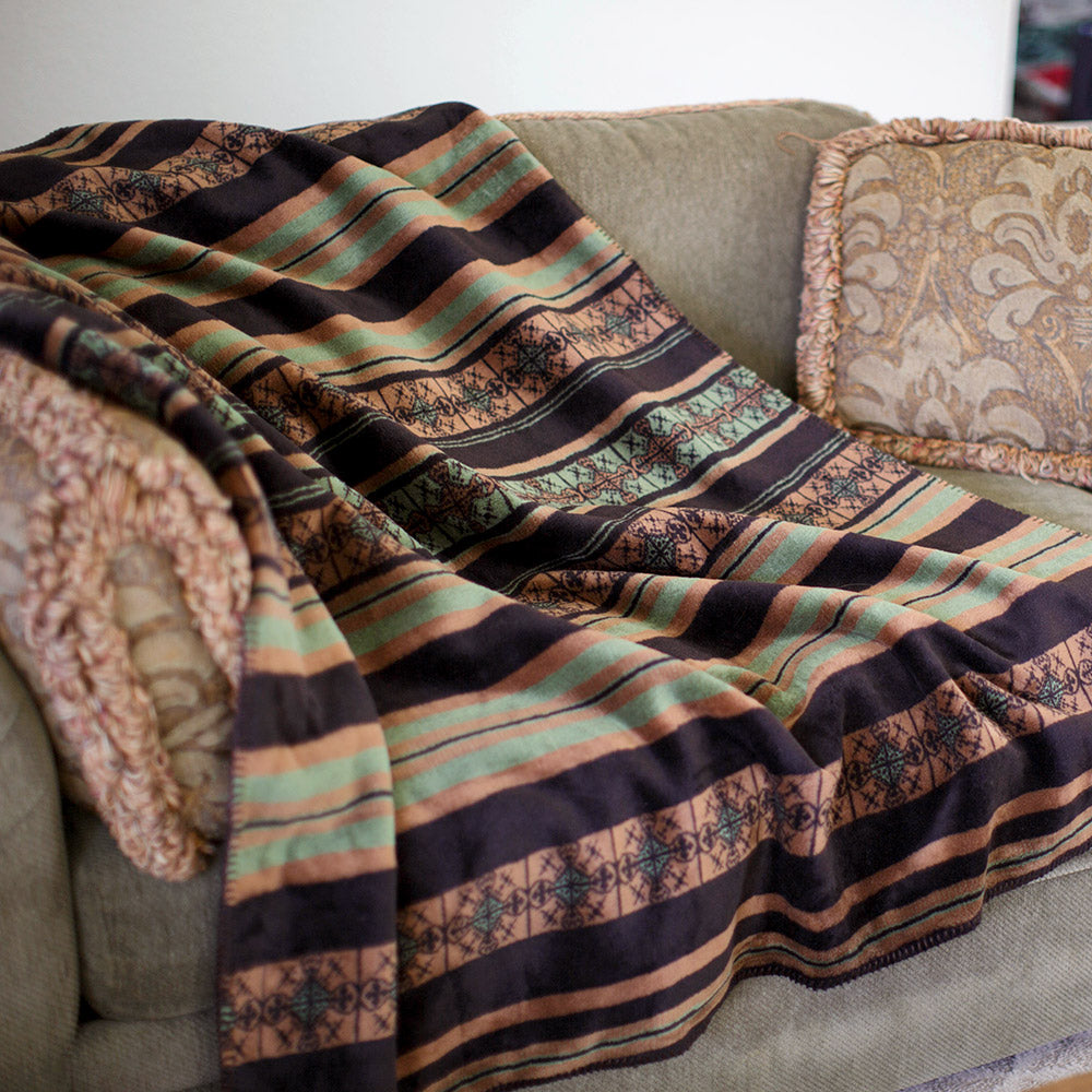 Throw blanket draped over couch