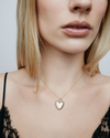 Image of model wearing the plain Fierce Heart charm on a chain