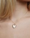 Image of model wearing the plain Fierce Heart charm on a chain