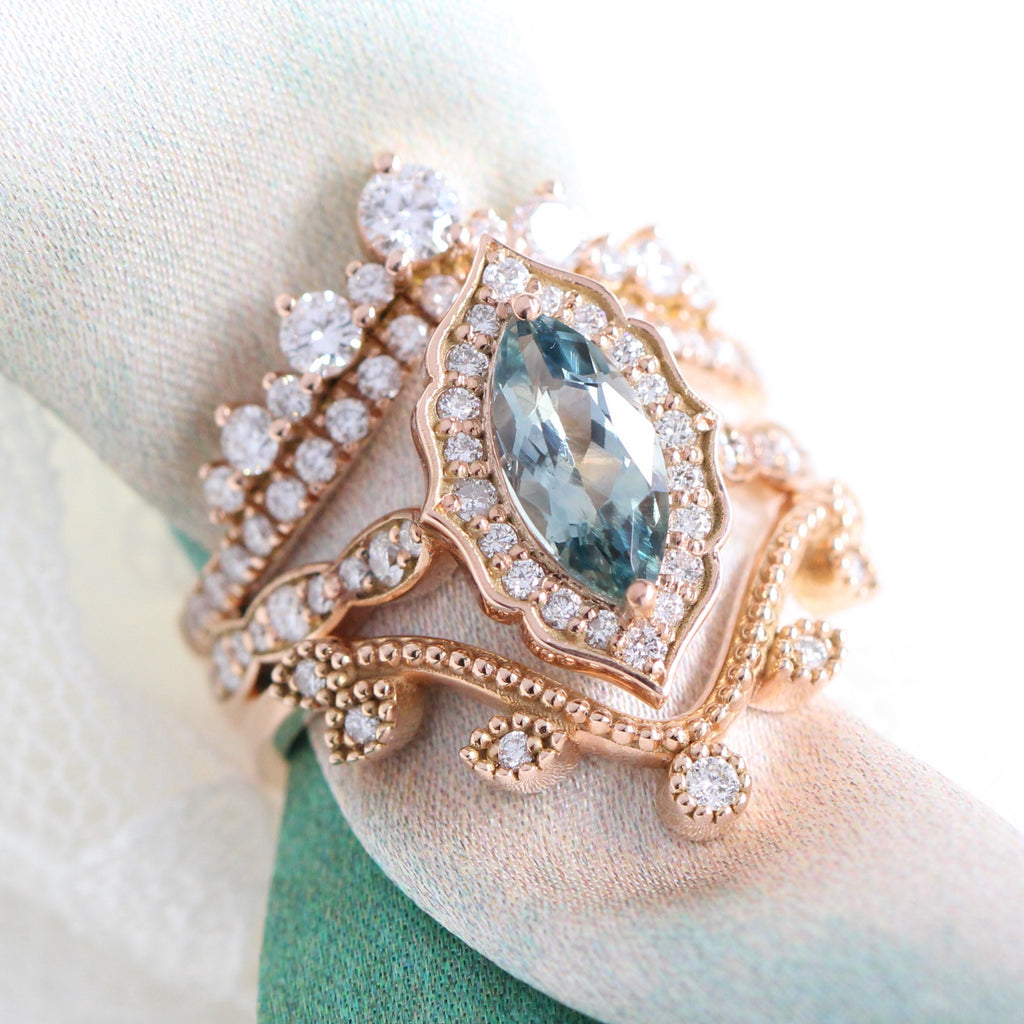 Teal green sapphire ring stack with deep curved diamond wedding bands la more design jewelry