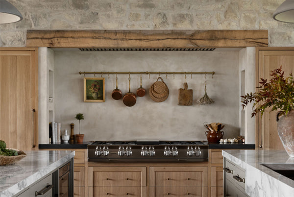 Old World Kitchen with Stone and Wood Beams