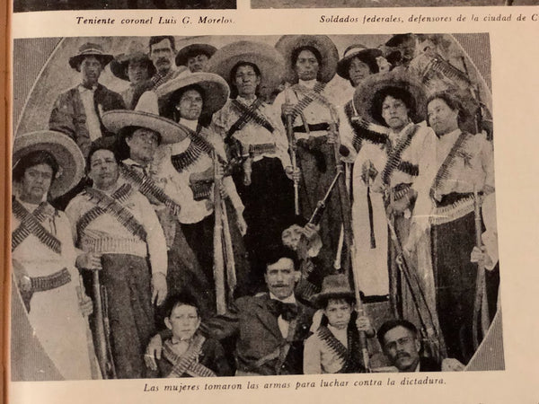 Soldadera women posing with rifles 